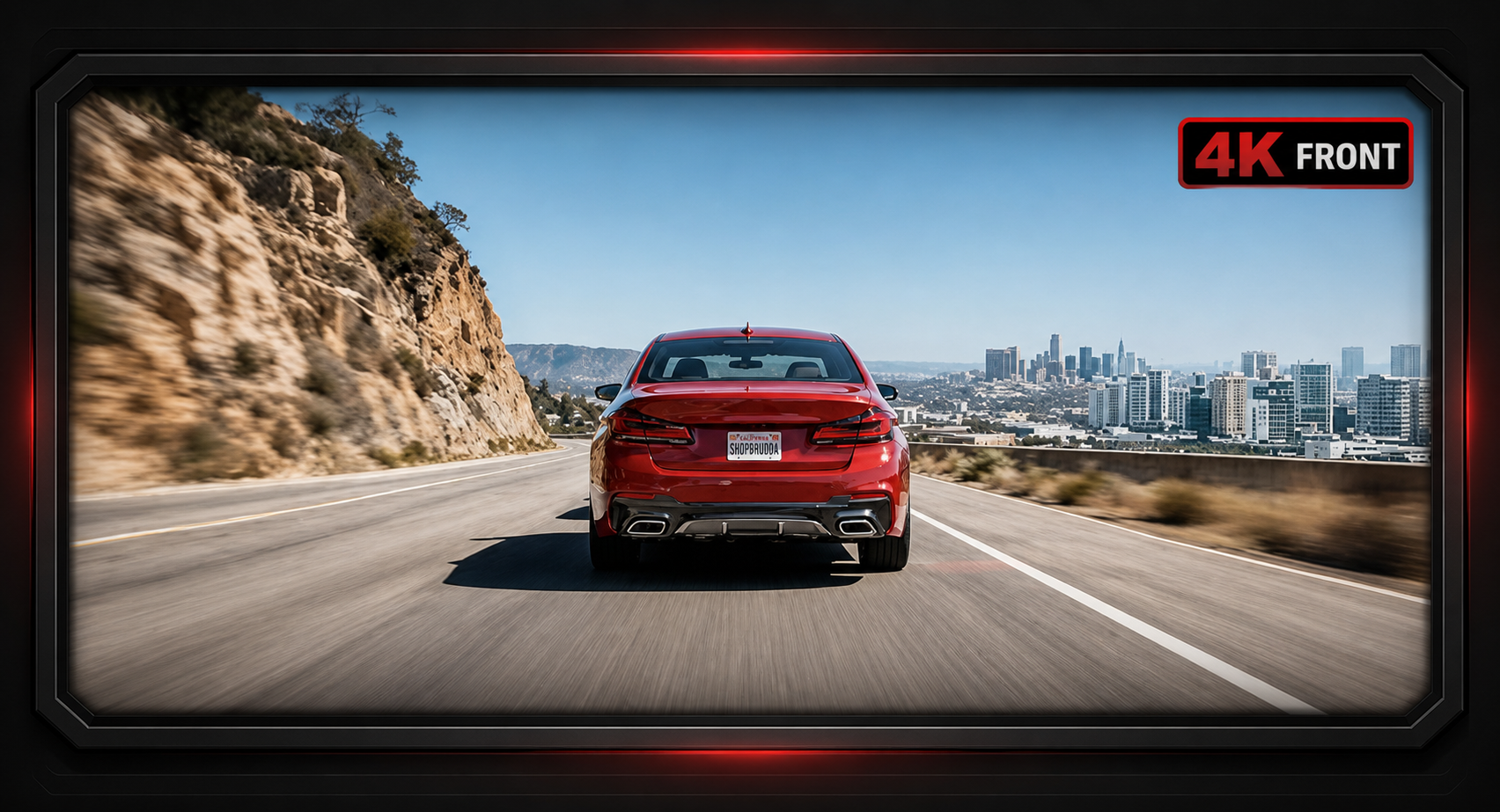 Sharp 4K front dash-camera road view with a red car and city detail